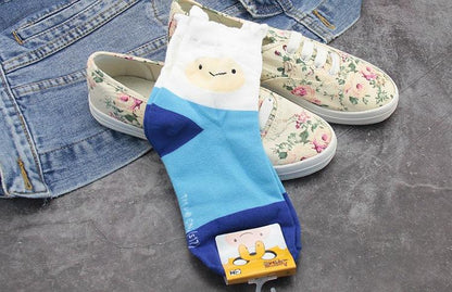 Stevvex Adventure Time crew socks with Ice King design in blue and white, packaged on Tampa Home & Garden Store