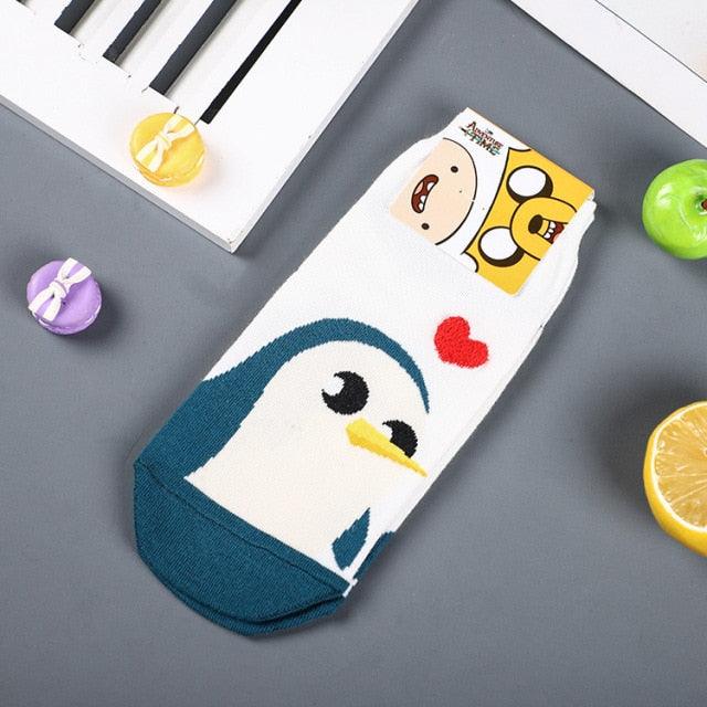 Stevvex crew socks penguin design, white with teal toe, Adventure Time packaging visible on Tampa Home & Garden Store