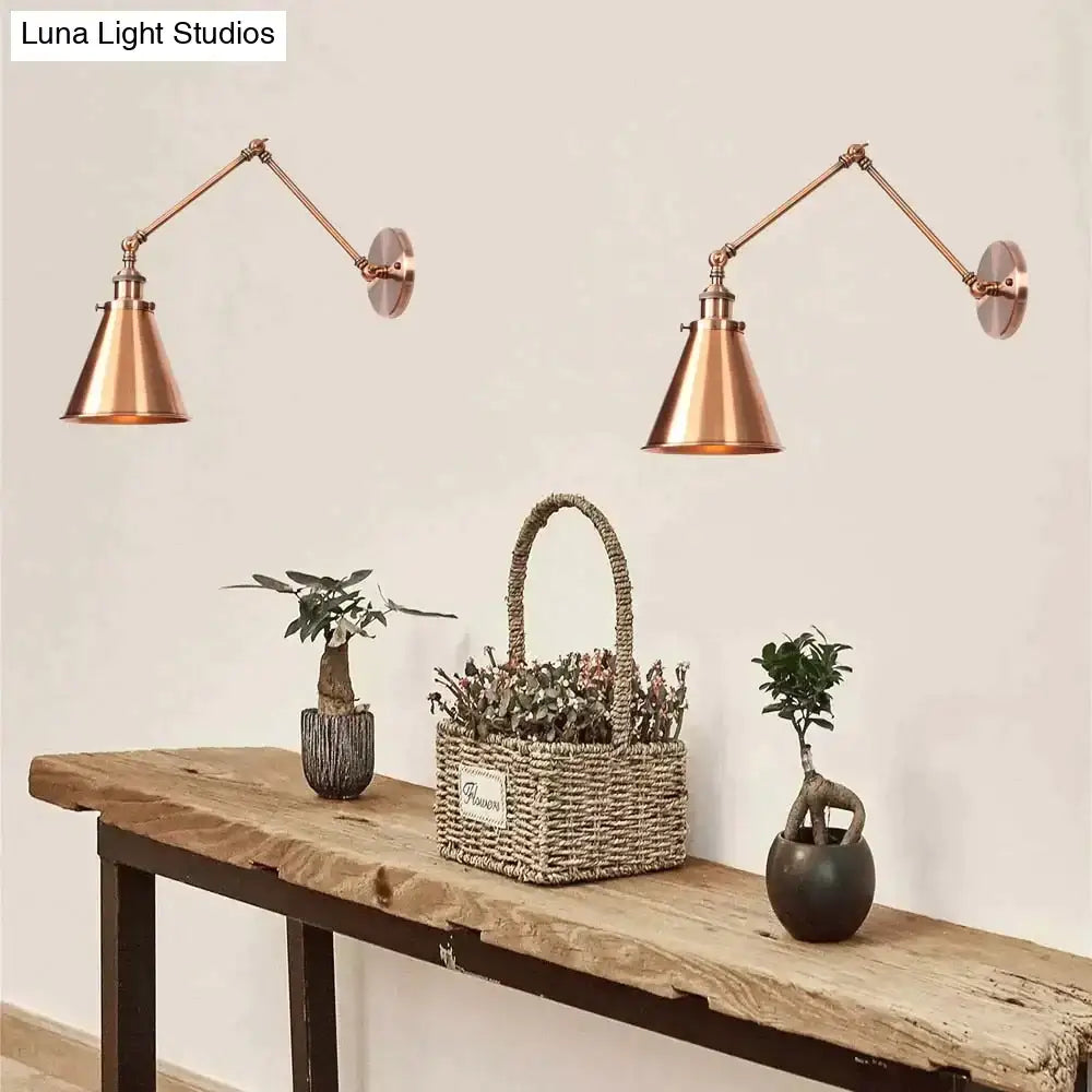 Adjustable wall lamp pair in copper finish with articulated arms on Tampa Home & Garden Store