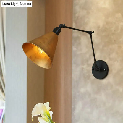 Decorbites iron art deco wall sconce with golden brass cone shade and black adjustable arm on Tampa Home & Garden Store