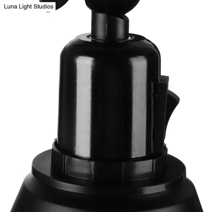 Iron Art Deco Sconce close-up of black metal wall light with rounded base and mounting collar on Tampa Home & Garden Store