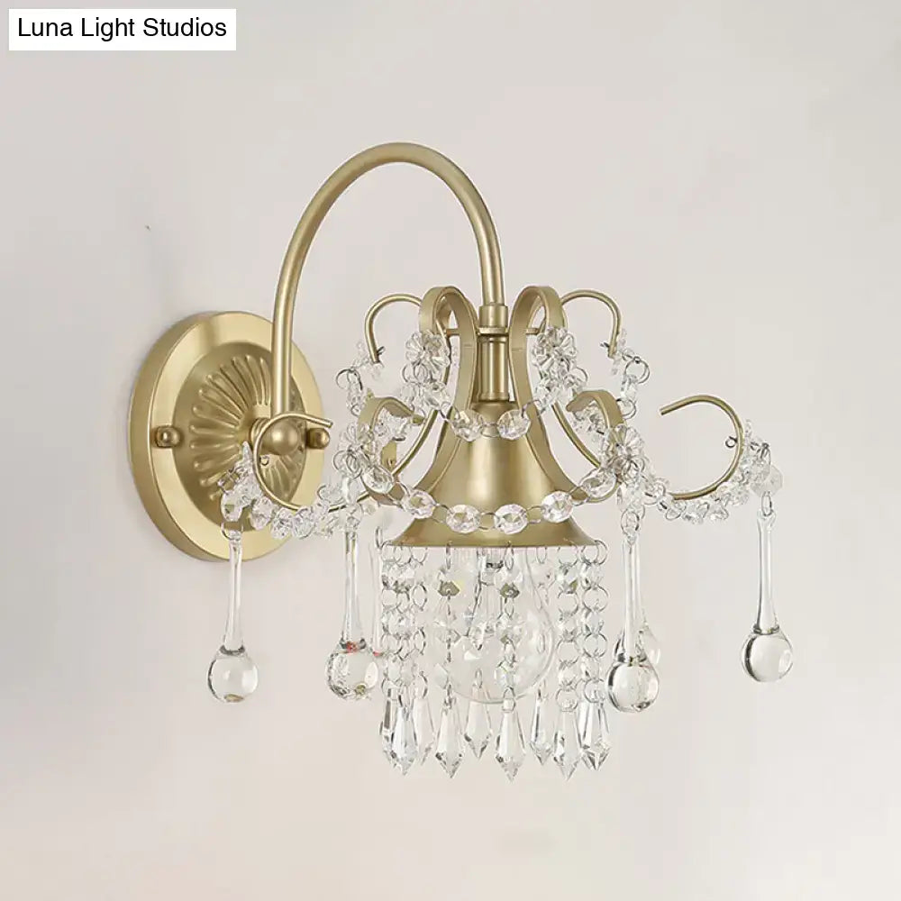 Brass crystal living area wall sconce by Decorbites with hanging crystal prisms on Tampa Home & Garden Store
