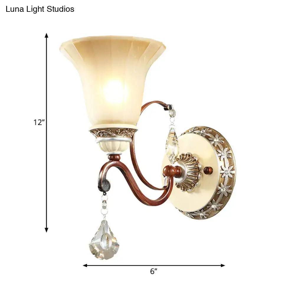 Decorbites Brass Cream Bell Sconce with frosted glass shade and crystal pendant on Tampa Home & Garden Store