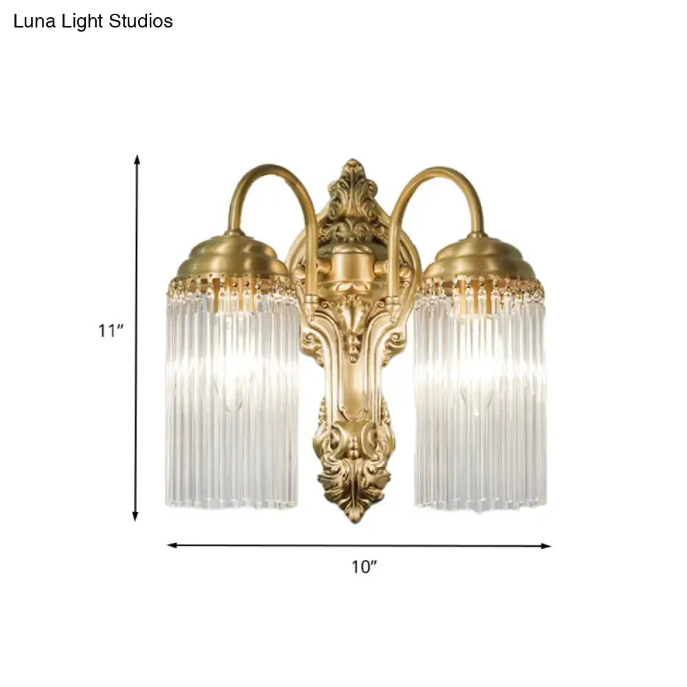 Brass crystal rod sconce with dual glass prisms and ornate backplate by Decorbites on Tampa Home & Garden Store