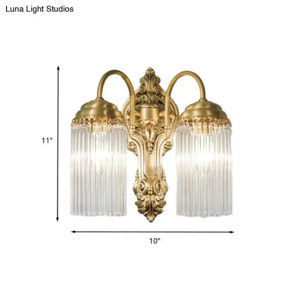 Brass crystal rod sconce with dual glass prisms and ornate backplate by Decorbites on Tampa Home & Garden Store