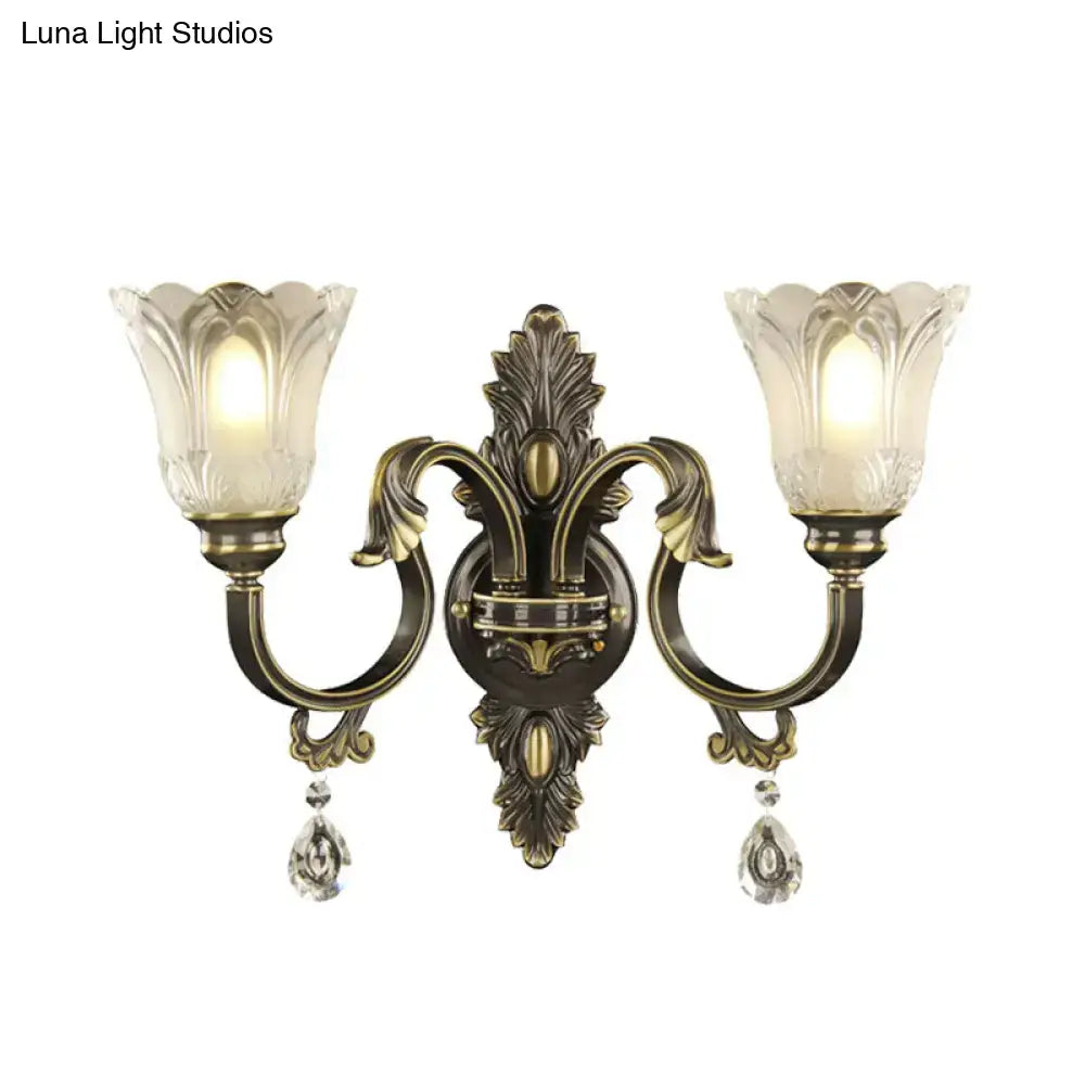 Brass floral black gold wall sconce by Decorbites with crystal drops and twin glass shades on Tampa Home & Garden Store