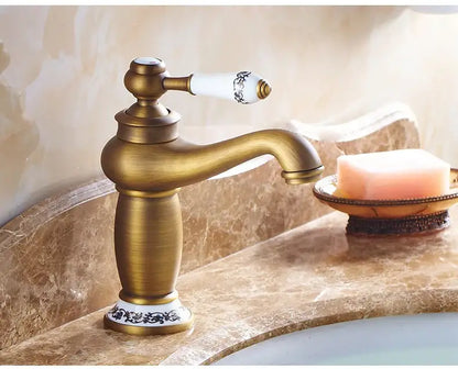 Bronze ceramic handle bathroom faucet Decorbites with white patterned lever on marble sink on Tampa Home & Garden Store