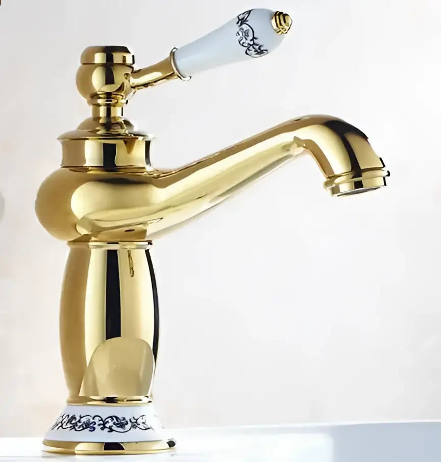 Bronze bathroom sink faucet with white blue-pattern ceramic handle by Decorbites on Tampa Home & Garden Store