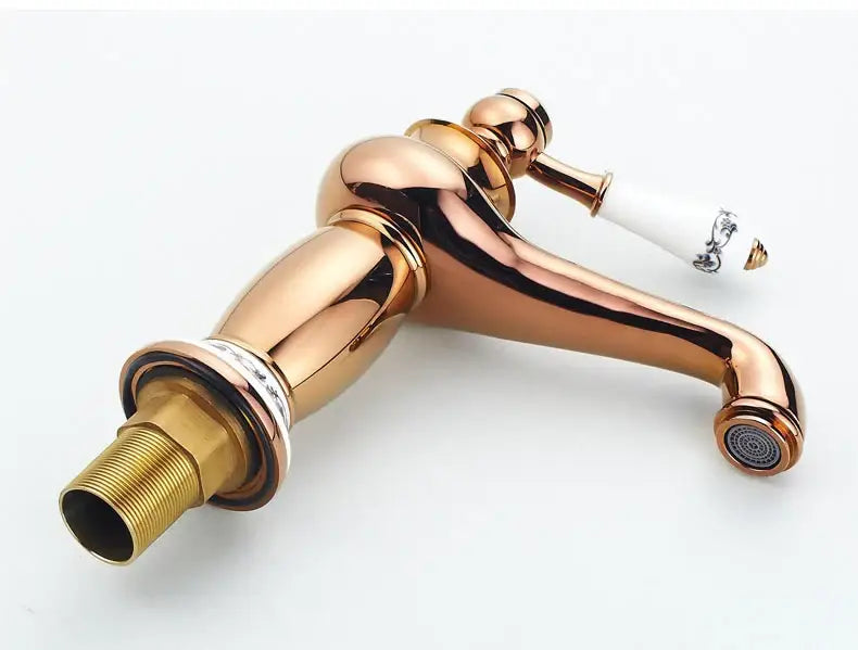 Bronze ceramic handle bathroom sink faucet with curved spout by Decorbites on Tampa Home & Garden Store