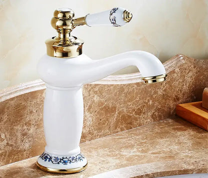 Bronze-accent ceramic handle bathroom faucet by Decorbites, white fixture with blue floral base on Tampa Home & Garden Store