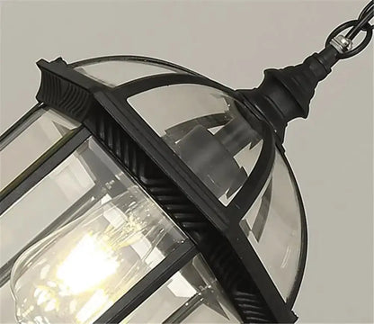 Antique bronze outdoor hanging pendant lantern with clear glass panels on Tampa Home & Garden Store