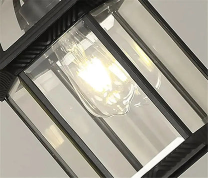 Antique bronze-black outdoor hanging pendant lantern by Decorbites with glass panels on Tampa Home & Garden Store
