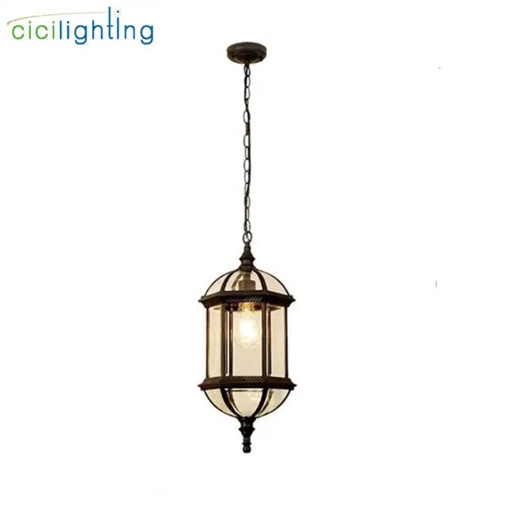 Antique bronze hanging pendant lantern with glass panels and chain on Tampa Home & Garden Store