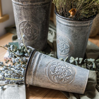 Antique Floral Carving Iron Flower Pot RusticReach metal with embossed motif on Tampa Home & Garden Store