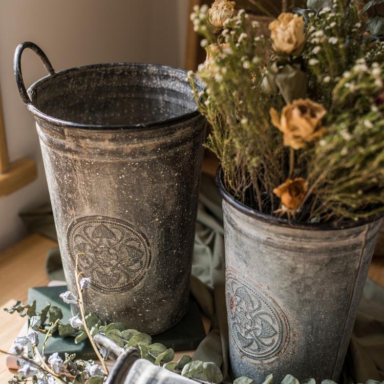 Antique Floral Iron Flower Pot set by RusticReach; two weathered pots with embossed medallions on Tampa Home & Garden Store