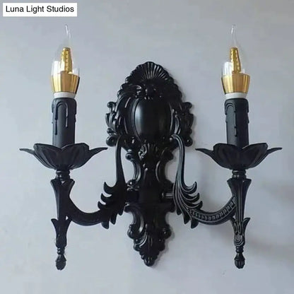 Gold Retro Wall Sconce with black ornate mount and candle-style bulbs on Tampa Home & Garden Store