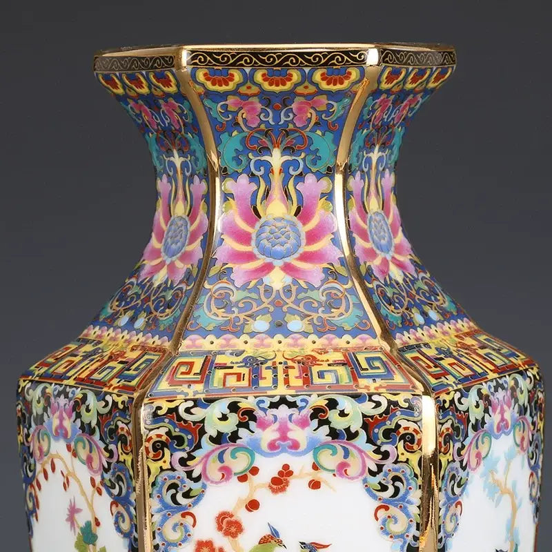 Porcelain octagonal vase by Decorbites with vibrant blue, pink and gold floral patterns on Tampa Home & Garden Store