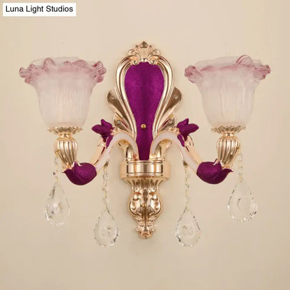 Gold double-head sconce with purple velvet backplate, crystal drops by Decorbites on Tampa Home & Garden Store