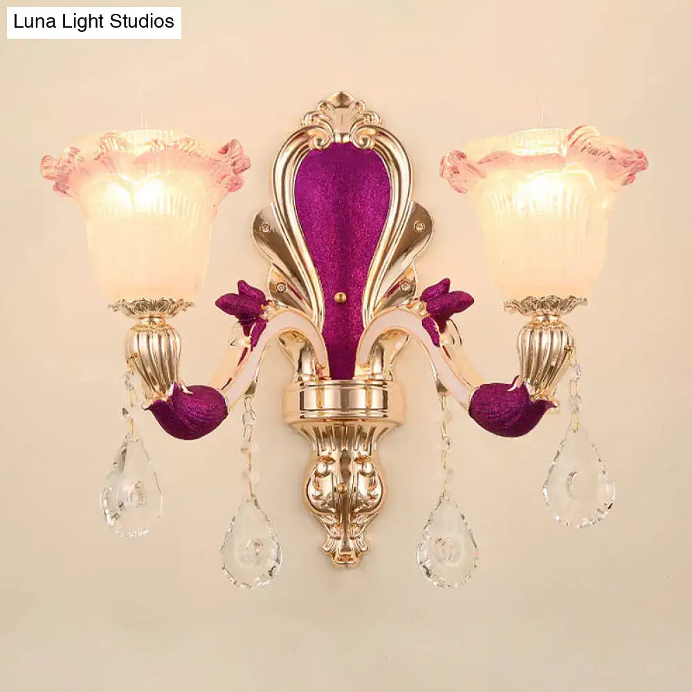 Gold double head sconce by Decorbites with purple velvet back and crystal drops on Tampa Home & Garden Store