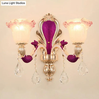 Gold double head sconce by Decorbites with purple velvet back and crystal drops on Tampa Home & Garden Store