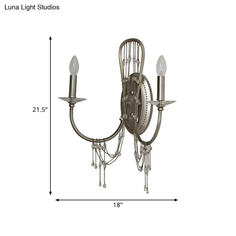 Silver crystal antique arm sconce with double candle bulbs and hanging crystal chains Decorbites on Tampa Home & Garden Store
