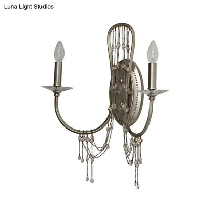 Silver Crystal Antique Arm Sconce by Decorbites with dual candle bulbs and hanging crystals on Tampa Home & Garden Store
