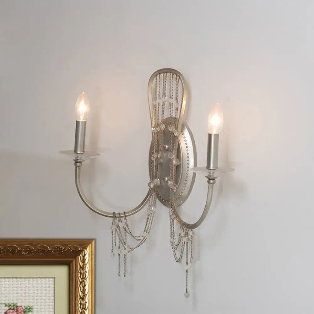 Silver Crystal Antique Arm Sconce by Decorbites, two candle bulbs with crystal strands on Tampa Home & Garden Store