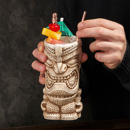 Pacific High Tide tiki mug set of 2, cream ceramic with carved tiki face and tropical drink on Tampa Home & Garden Store