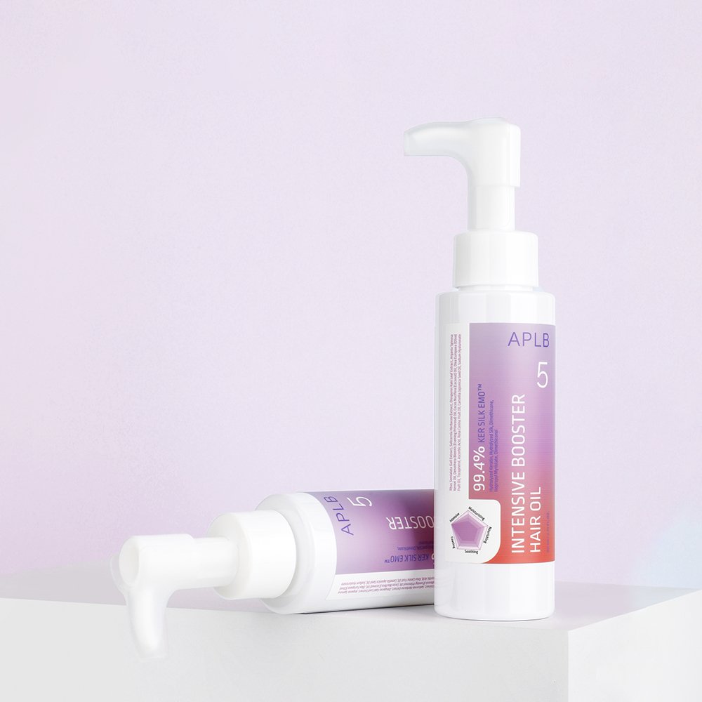 APLB Intensive Booster Hair Oil 80ml bottle with pump by Seoulia; two purple bottles on Tampa Home & Garden Store
