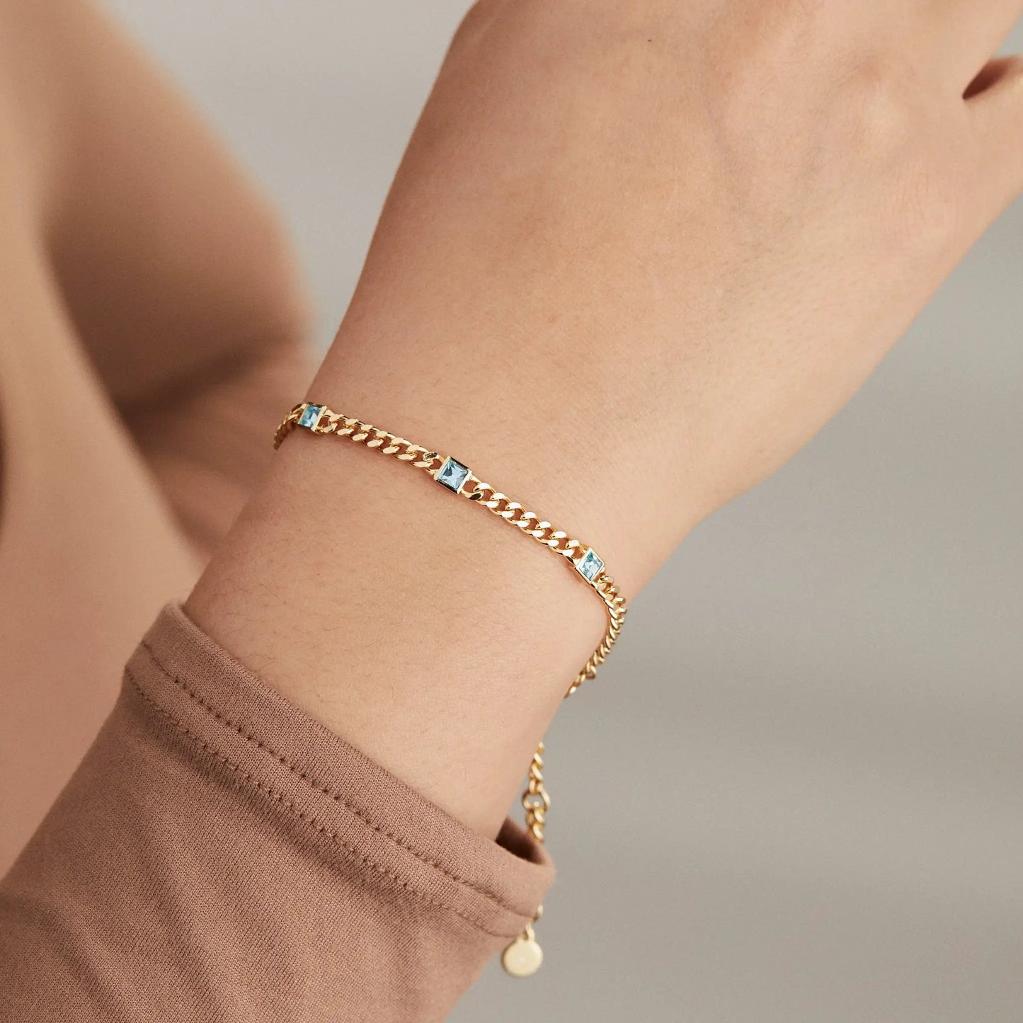 Bracelet Aquamarine Curb Chain by ALEX AND ANI with blue stones on gold chain on Tampa Home & Garden Store