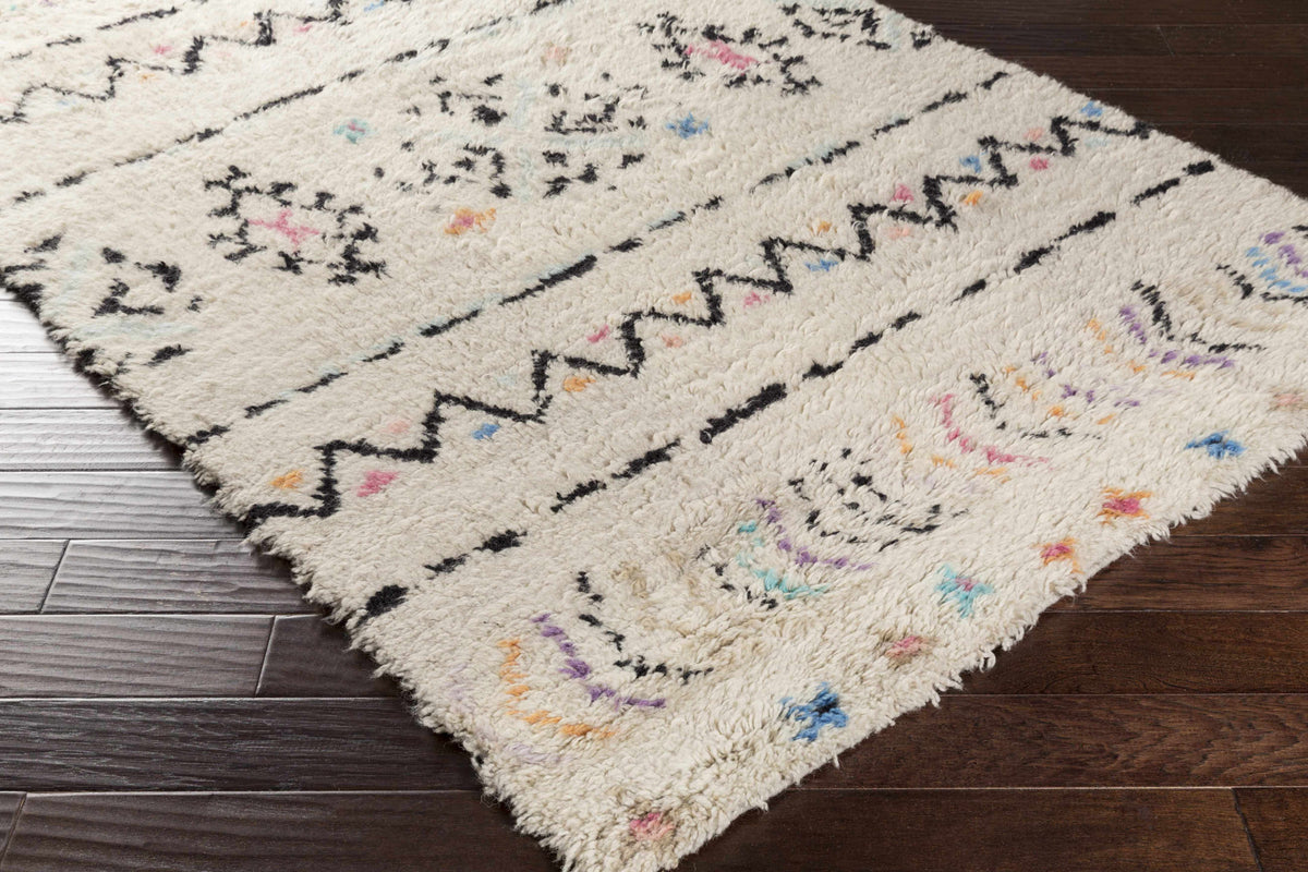 Arcanum hand knotted wool rug cream with black zigzags and pastel flecks Boutique Rugs on Tampa Home & Garden Store