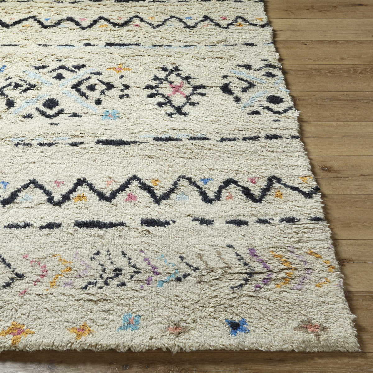 Arcanum hand knotted wool area rug cream black geometric motifs Boutique Rugs clearance on Tampa Home & Garden Store