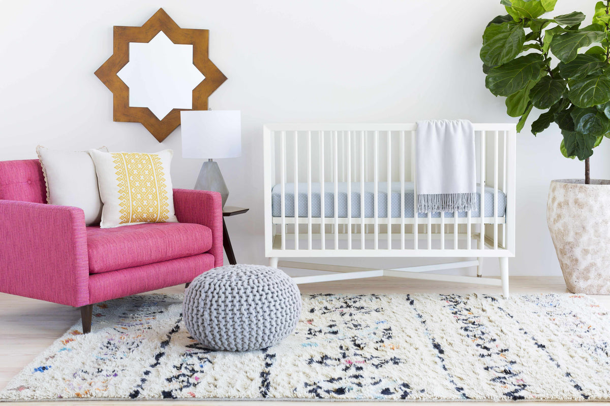 Arcanum hand knotted wool area rug by Boutique Rugs ivory base with multicolor flecks on Tampa Home & Garden Store