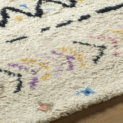 Arcanum Hand Knotted Wool Area Rug by Boutique Rugs; cream base with multicolor flecks on Tampa Home & Garden Store