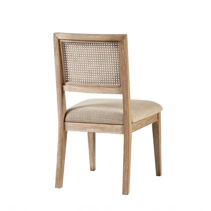 Armless dining chair with a cane back, beige upholstered seat, tapered wood legs on Tampa Home & Garden Store