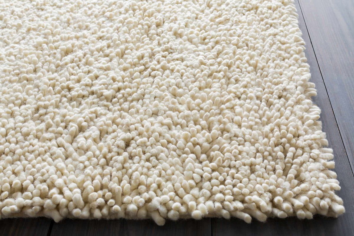 Oakridge Area Rug by Boutique Rugs, cream shag pile on Tampa Home & Garden Store