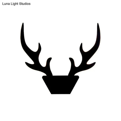 Art deco black antler wall sconce with geometric base Decorbites bedroom lighting on Tampa Home & Garden Store