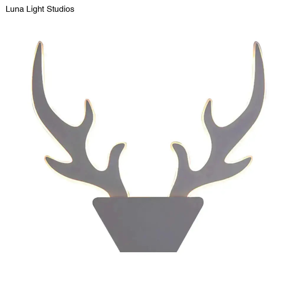 Art deco antler wall sconce black & white with illuminated edges by Decorbites on Tampa Home & Garden Store