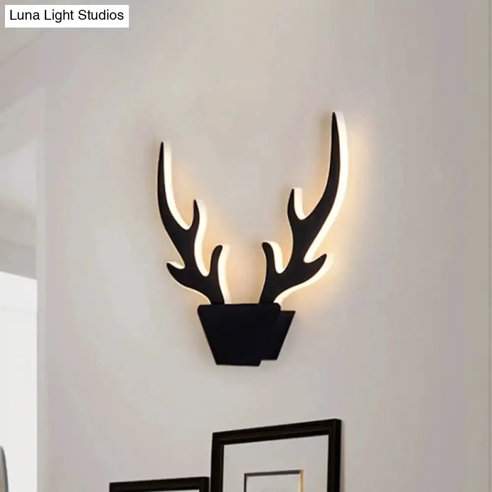Art deco black and white antler wall sconce Decorbites with illuminated edges for bedroom on Tampa Home & Garden Store