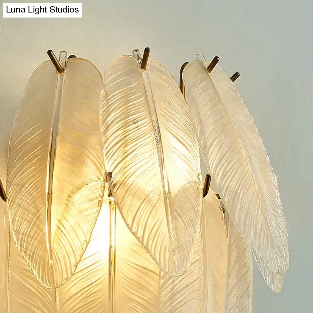 Brass leaf glass sconce by Decorbites with ribbed frosted glass leaves and brass accents on Tampa Home & Garden Store