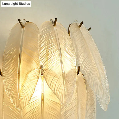Brass leaf glass sconce by Decorbites with ribbed frosted glass leaves and brass accents on Tampa Home & Garden Store