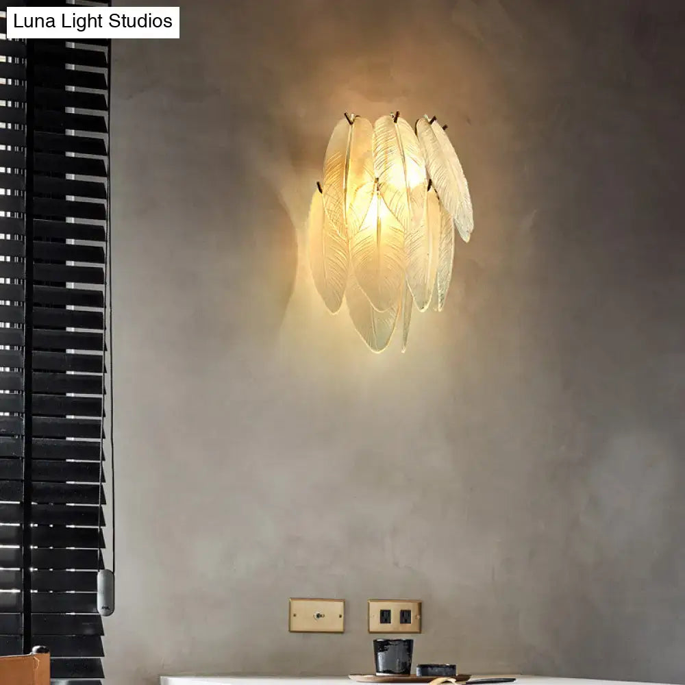 Brass Leaf Glass Sconce with layered frosted leaf panels, warm glow, Decorbites on Tampa Home & Garden Store
