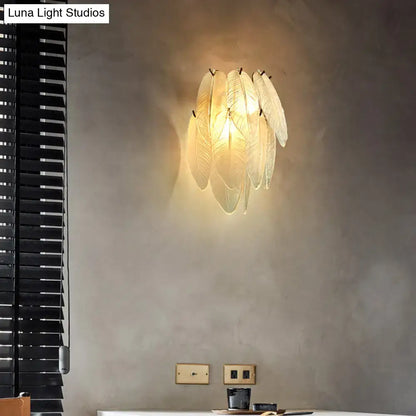Brass Leaf Glass Sconce with layered frosted leaf panels, warm glow, Decorbites on Tampa Home & Garden Store