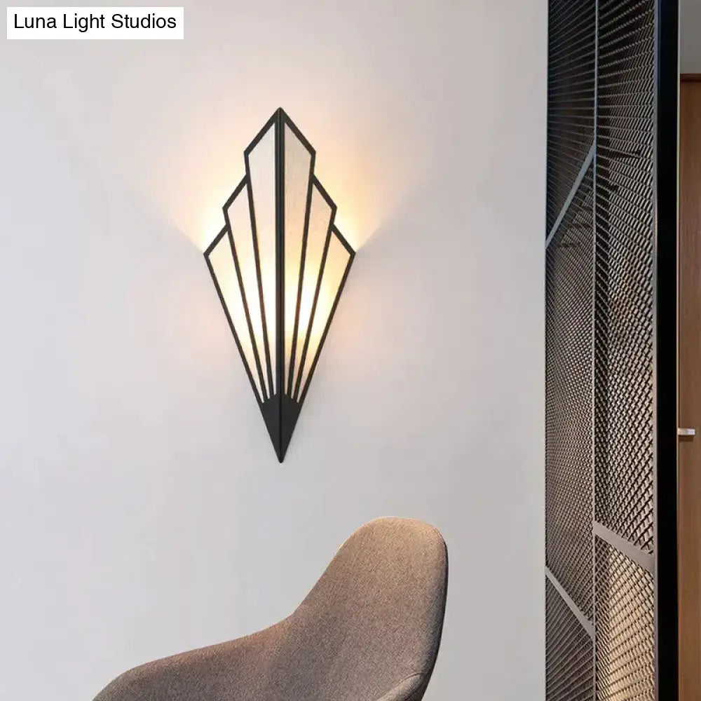 Gold Diamond Wall Light wall sconce by Decorbites; black geometric frame with warm glow on wall on Tampa Home & Garden Store