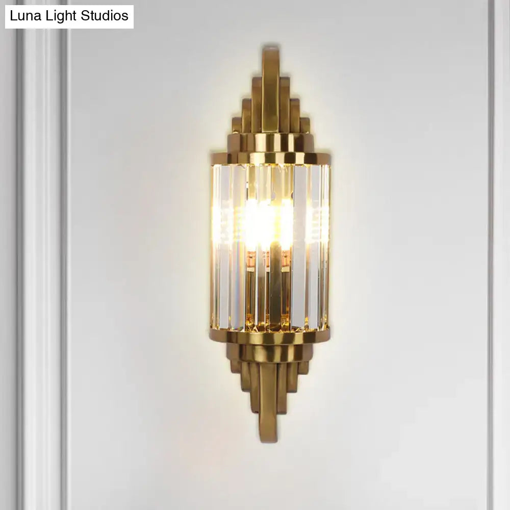 Gold crystal art deco wall light sconce with a geometric stepped brass frame by Decorbites on Tampa Home & Garden Store
