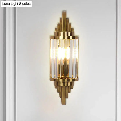 Gold crystal art deco wall light sconce with a geometric stepped brass frame by Decorbites on Tampa Home & Garden Store