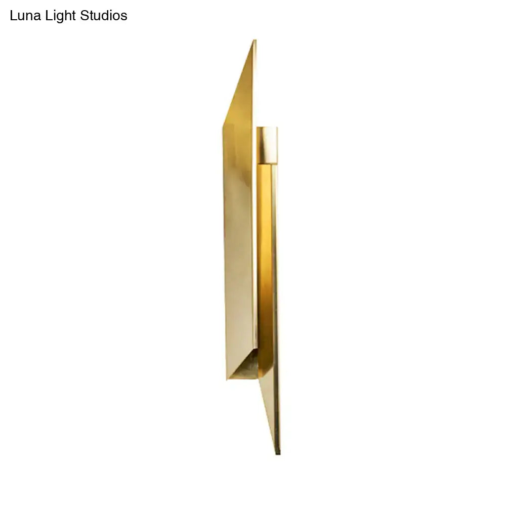 Decorbites gold geometric wall sconce with angular brass finish on Tampa Home & Garden Store