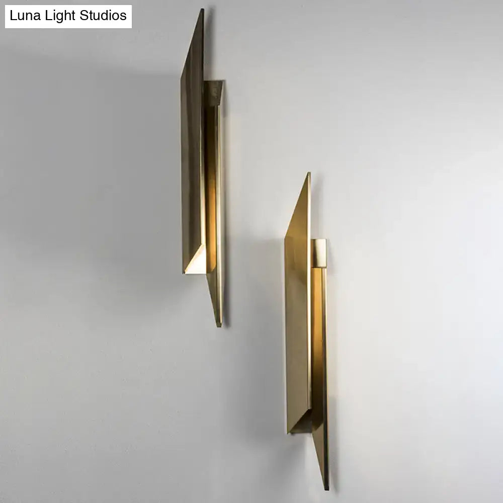 Gold geometric wall sconces (pair) by Decorbites, brass angular panels on gray wall on Tampa Home & Garden Store
