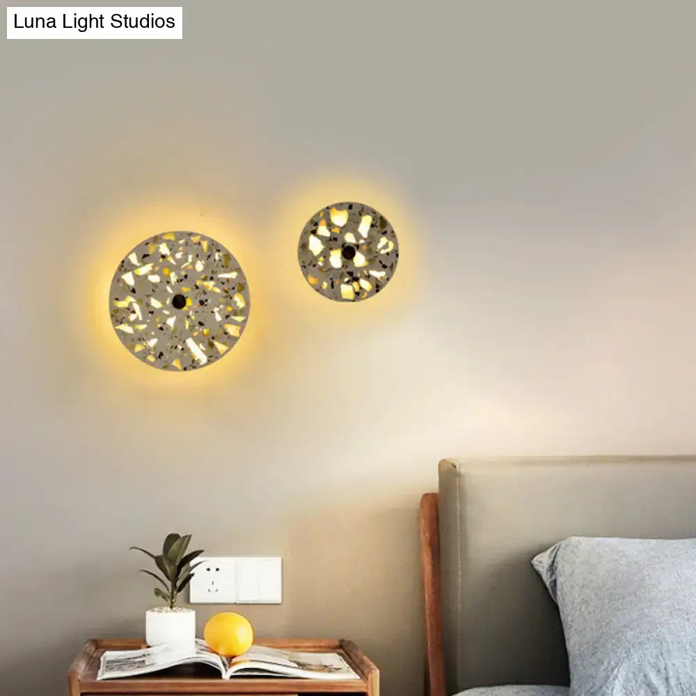 Decorbites terrazzo LED wall light; two circular terrazzo wall lamps with warm glow on Tampa Home & Garden Store