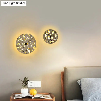 Decorbites terrazzo LED wall light; two circular terrazzo wall lamps with warm glow on Tampa Home & Garden Store